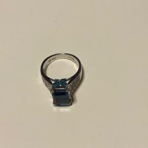 Blue and white topaz rhodium ring